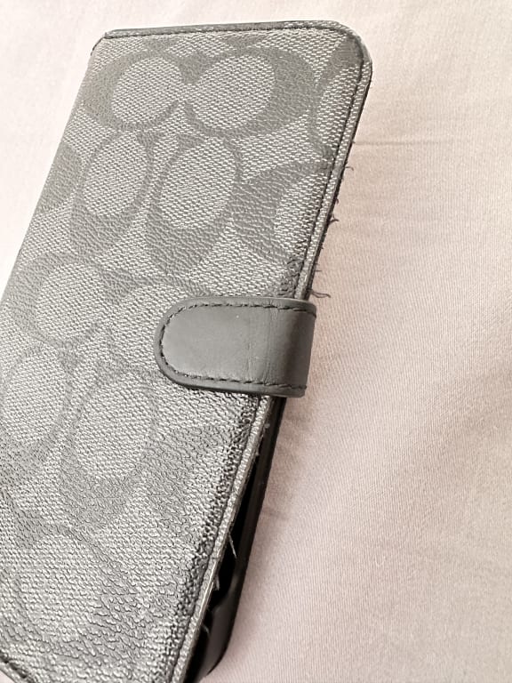 COACH® | Iphone 14 Pro Folio In Signature Canvas With Wildflower