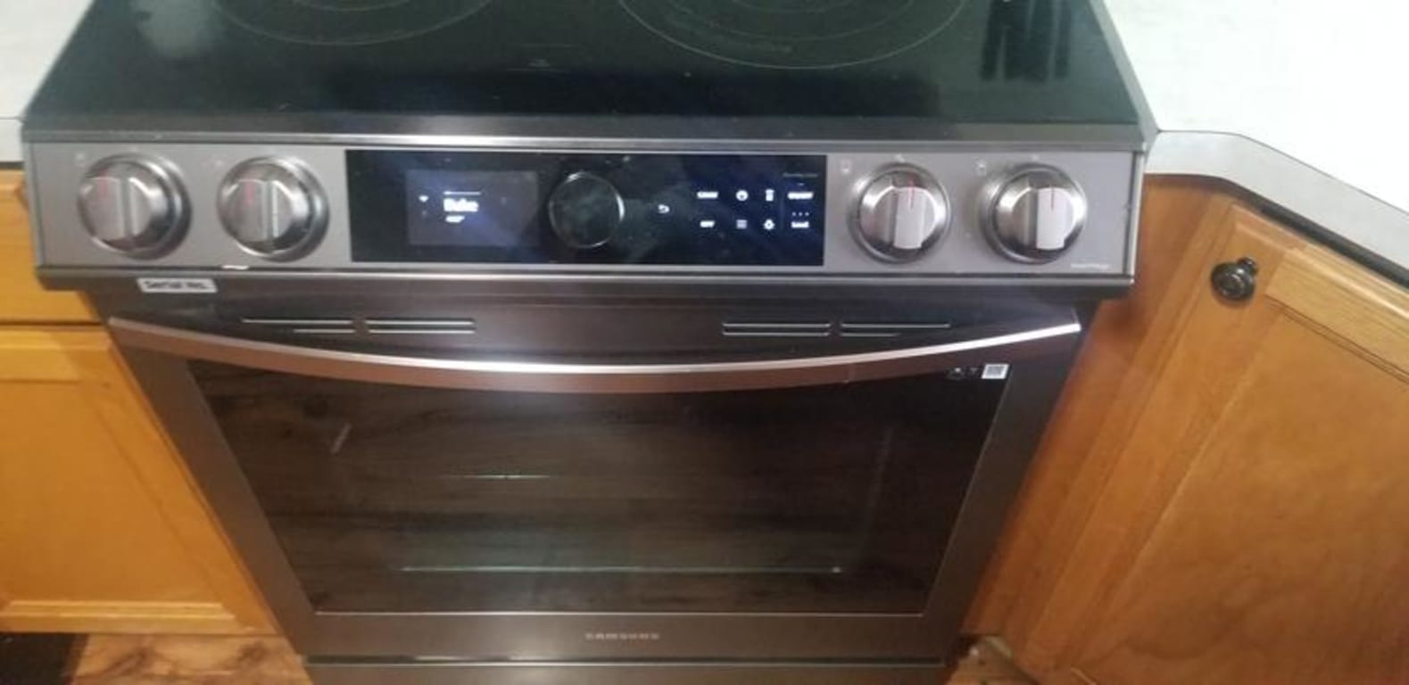 Samsung 6.3 Cu. ft. Slide-in Electric Range with Smart Dial & Air Fry, Black Stainless Steel - NE63T8711SG