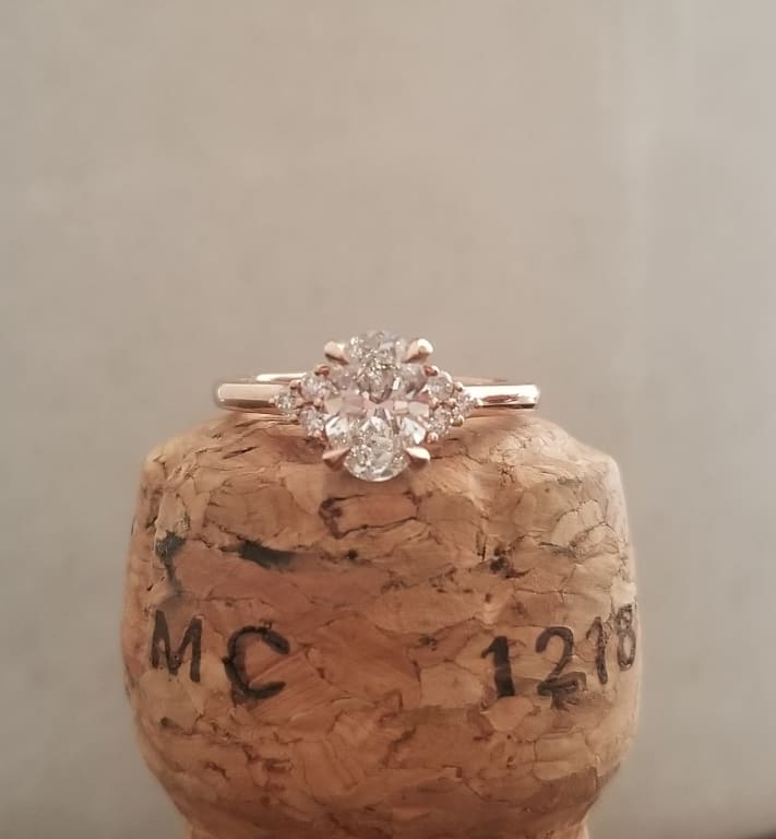 Oval diamond ring on hand