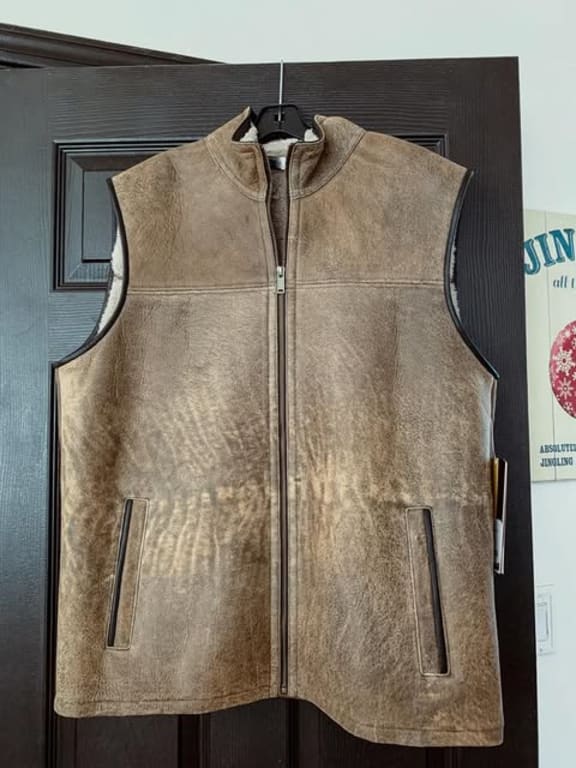 Customer Image Captioned: Nice vest but not that rich warm tone that is shown in picture.