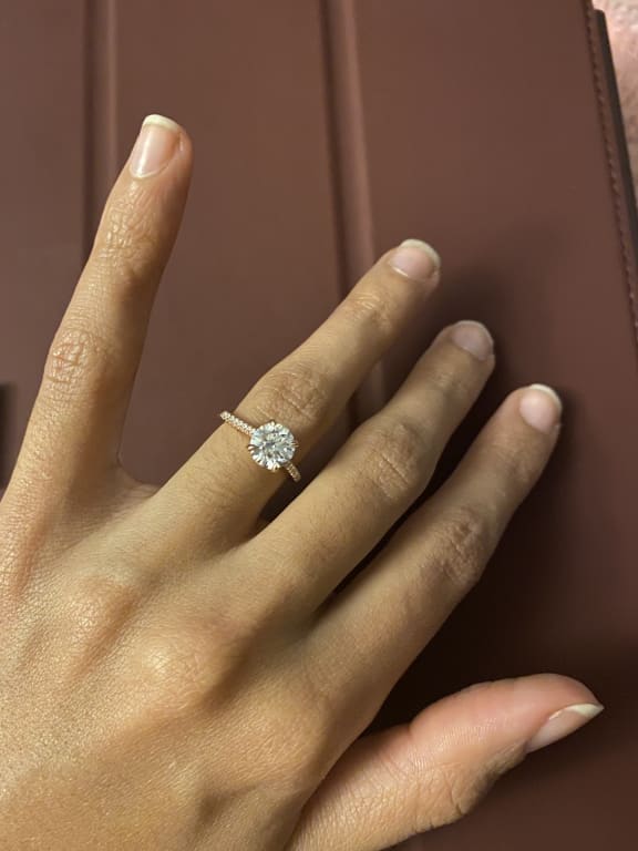 Oval diamond ring on hand