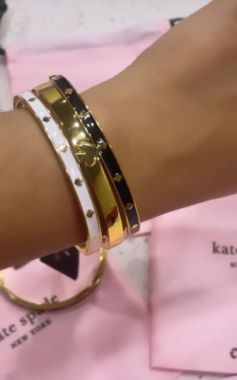 Kate Spade clamp gold bracelet with iridescent - Depop