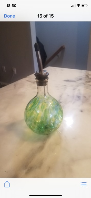 Handblown Glass Olive Oil Pourer from Uncommon Goods. Customer submitted image.