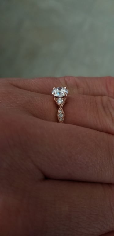 Oval diamond ring on hand