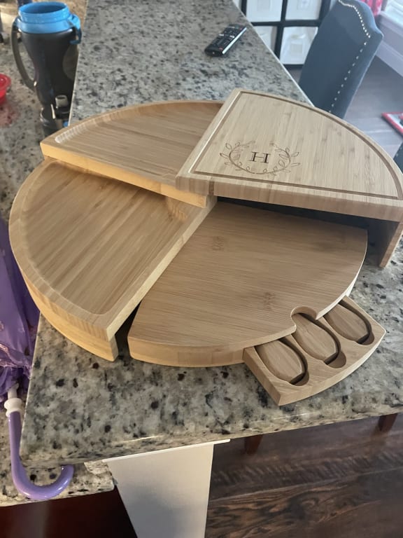 Personalized Compact Swivel Cheese Board from Uncommon Goods. Customer submitted image.