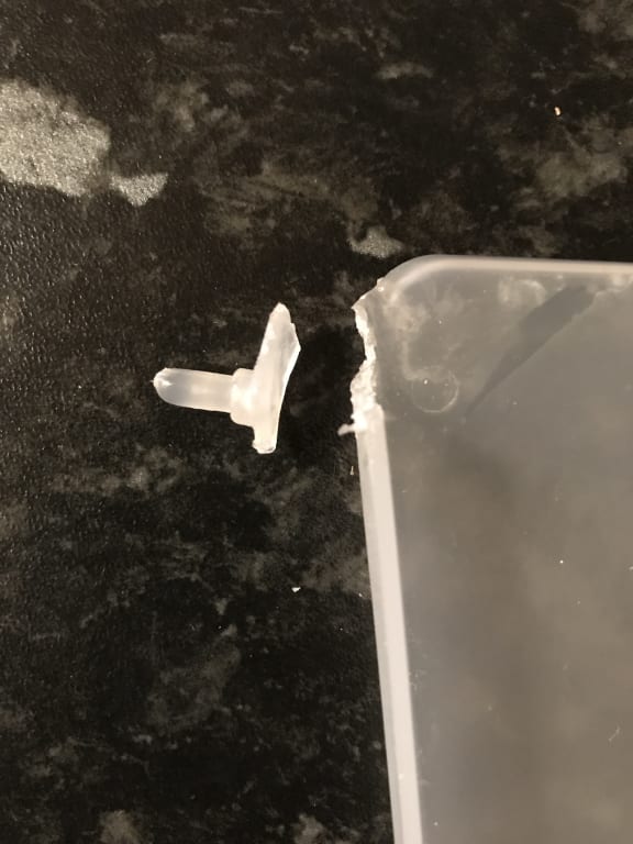 tab snapped off flap