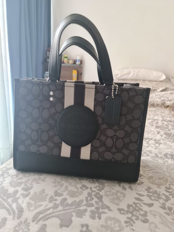 COACH®  Disney X Coach Dempsey Carryall With Cruella Motif