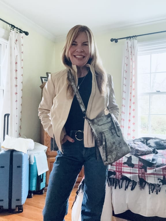 Customer Image Captioned: Paired with the sheepskin jacket