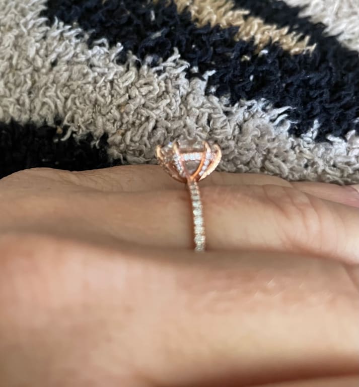 Oval diamond ring on hand