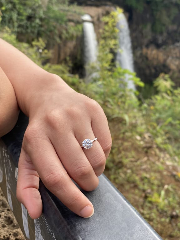 Oval diamond ring on hand