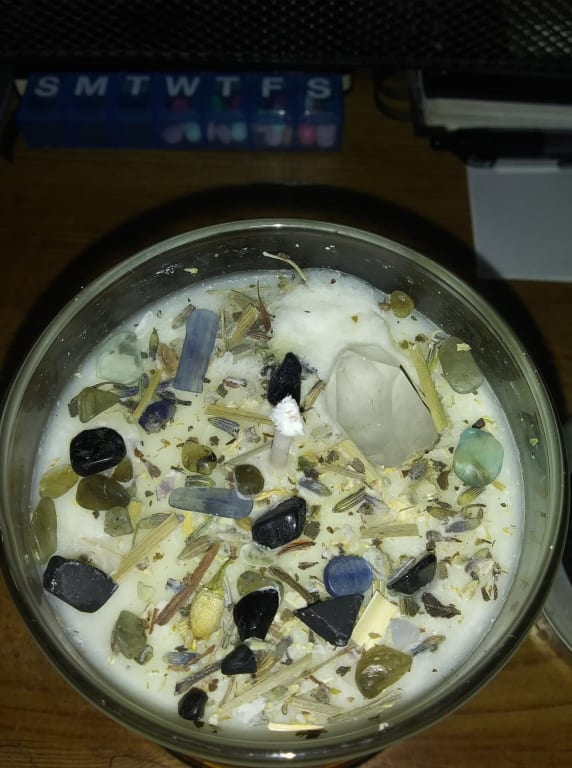 Mercury Retrograde Protection Candle from Uncommon Goods. Customer submitted image.