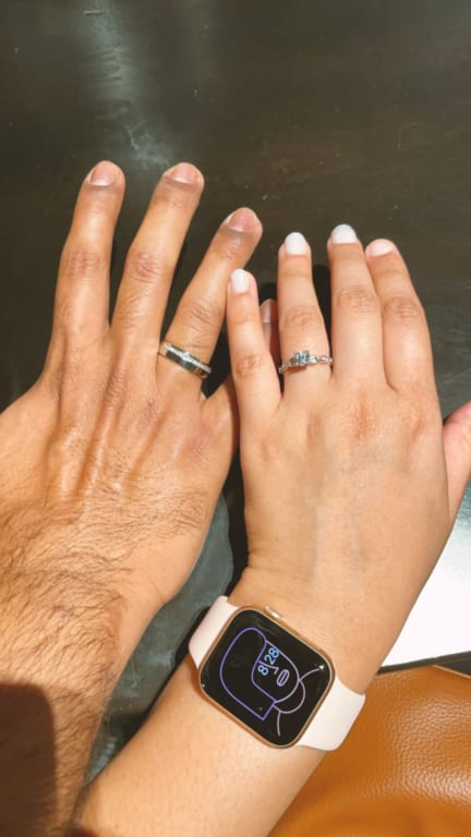 Oval diamond ring on hand