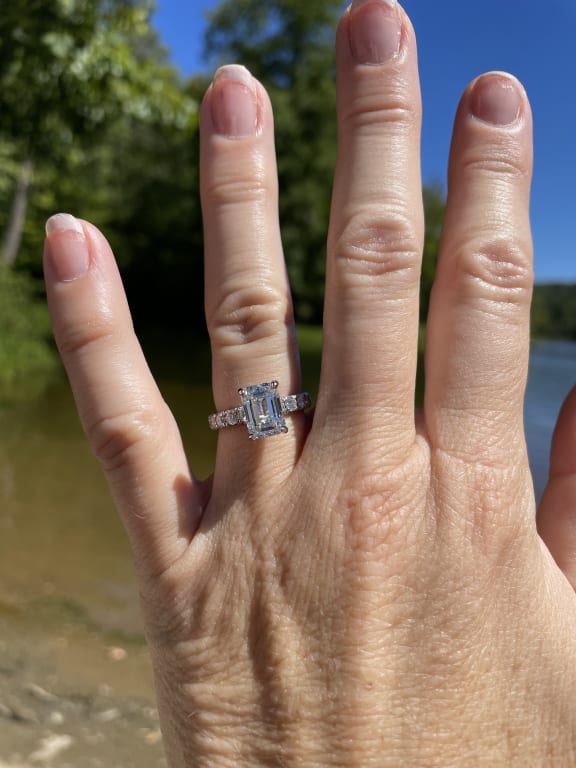 Oval diamond ring on hand