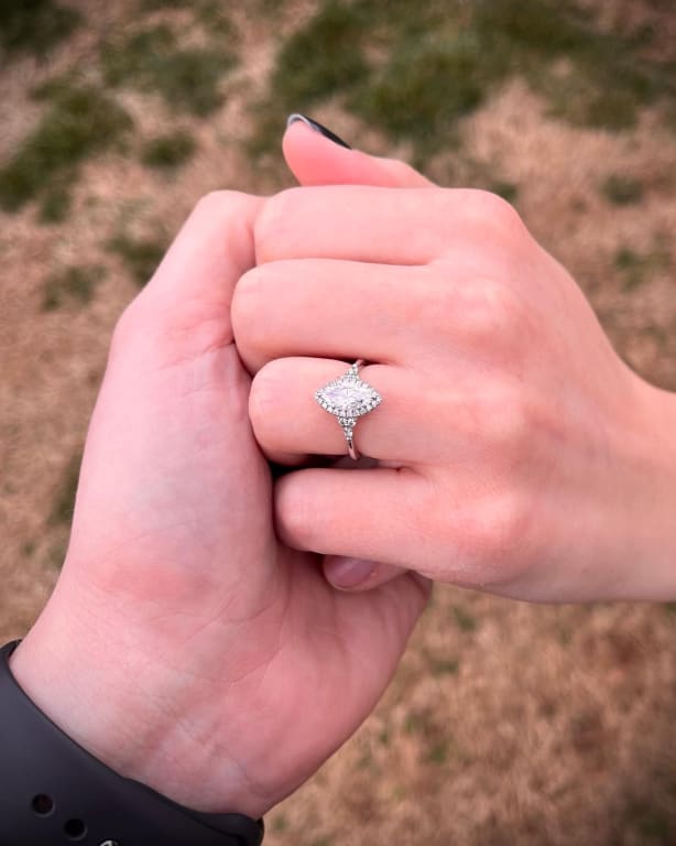 Oval diamond ring on hand