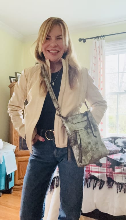 Customer Image Captioned: This photo features their cross body bag. Which a customer service rep so thoughtfully helped me select during a series of phone calls and emails.