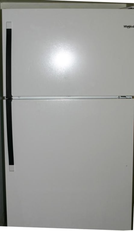 Black refrigerator handles installed