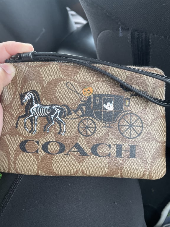 COACH OUTLET®  Corner Zip Wristlet In Signature Canvas With Wildflower  Print
