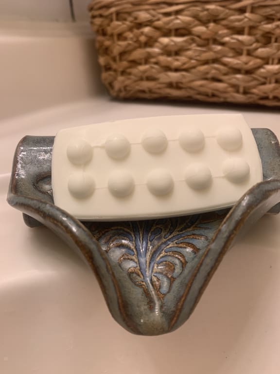 Ceramic Self-Draining Soap Dish from Uncommon Goods. Customer submitted image.