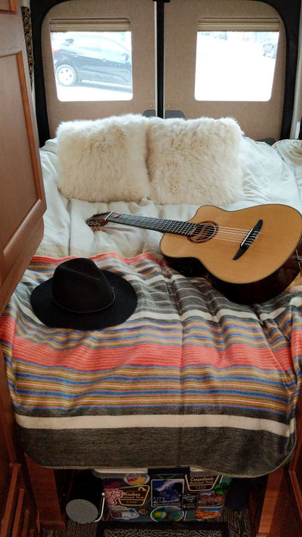 Customer Image Captioned: Overland accents made our bed cozy!