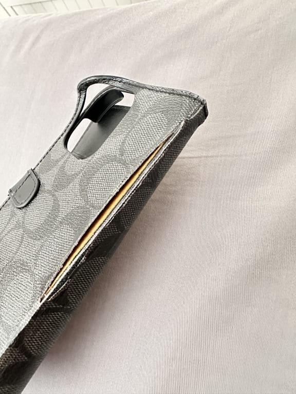 COACH®: Iphone 14 Pro Max Case In Signature Canvas