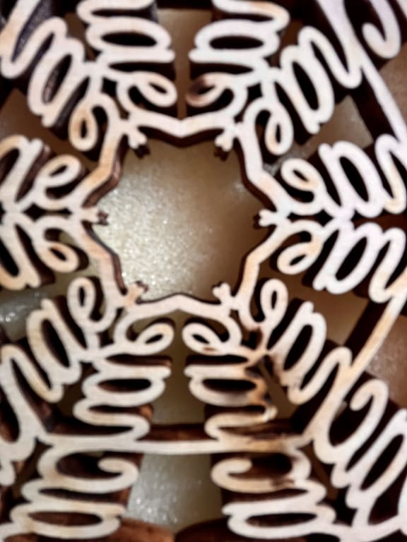 Your Name in a Snowflake Ornament from Uncommon Goods. Customer submitted image.