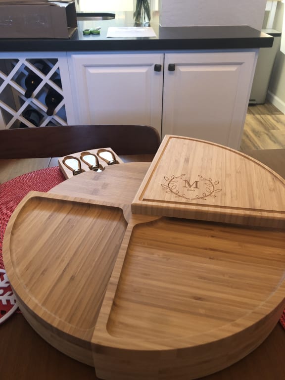 Personalized Compact Swivel Cheese Board from Uncommon Goods. Customer submitted image.