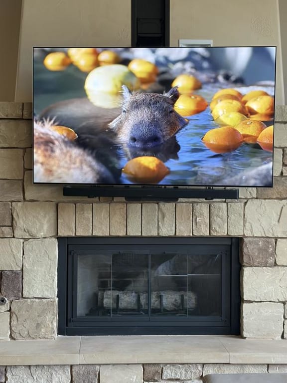 Bose Smart Ultra Soundbar mounted on a MantleMount motorized mount