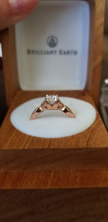 Oval diamond ring on hand