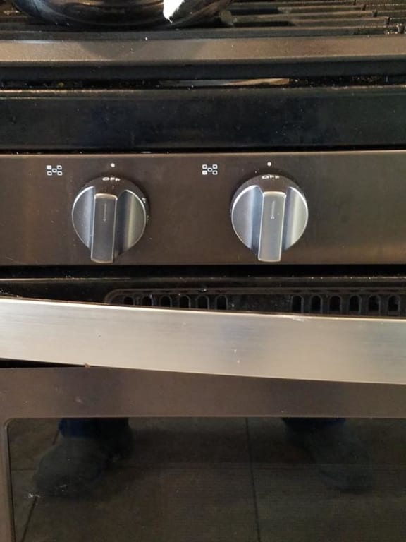 knob on right is the replacement, much brighter in color
