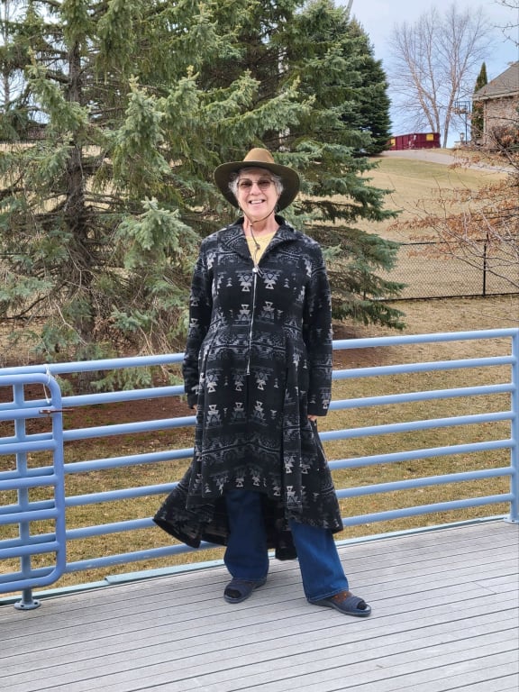 Customer Image Captioned: Cool hat and coat