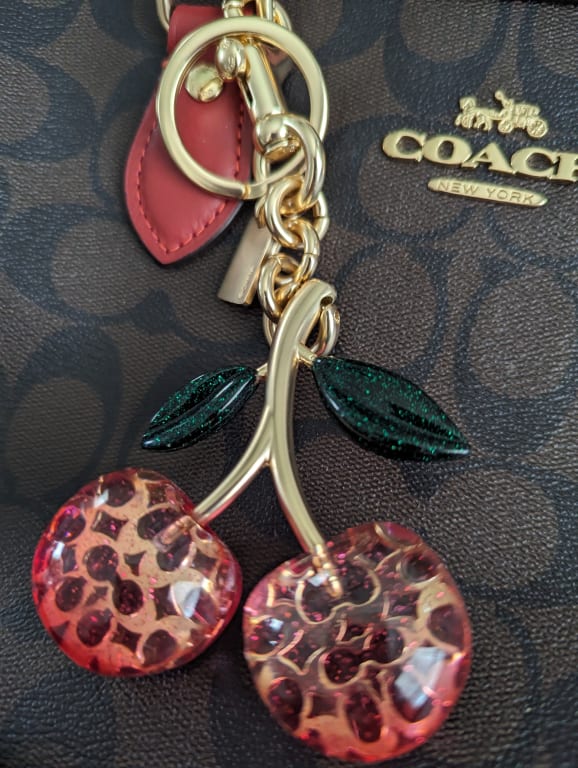 COACH®: Signature Bag Charm