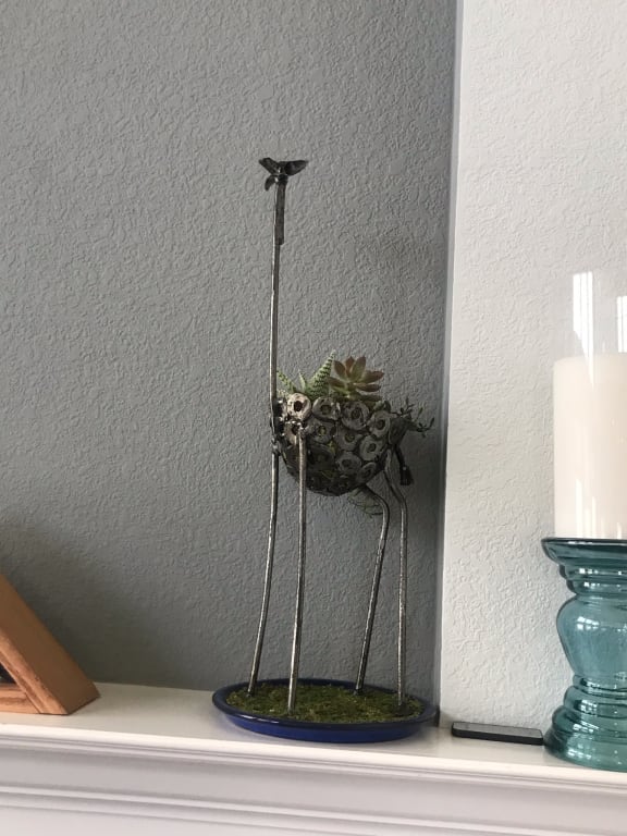Recycled Metal Giraffe Planter from Uncommon Goods. Customer submitted image.