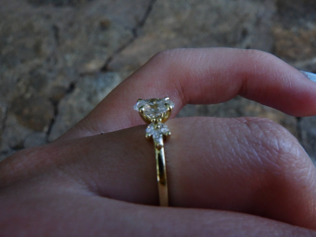 Oval diamond ring on hand