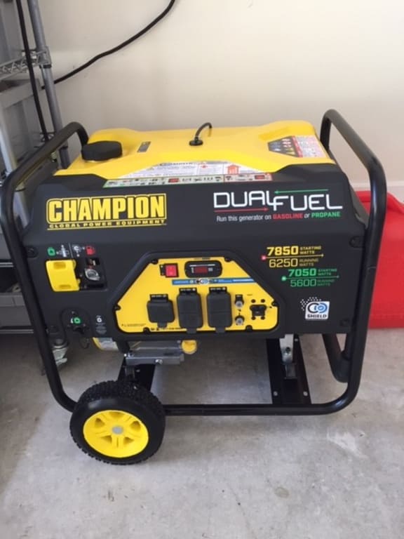 Champion 7,850W Portable Hybrid Dual Fuel Gas Powered Generator with