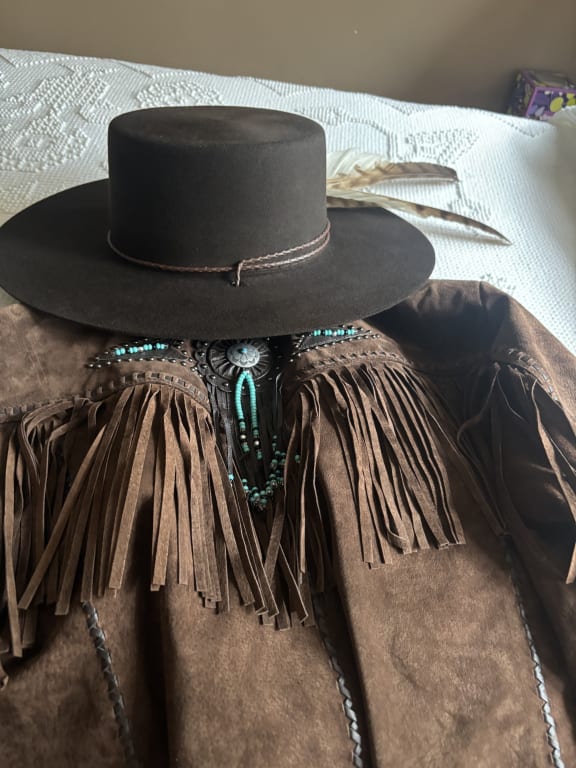 Customer Image Captioned: I added the hawk feathers!
