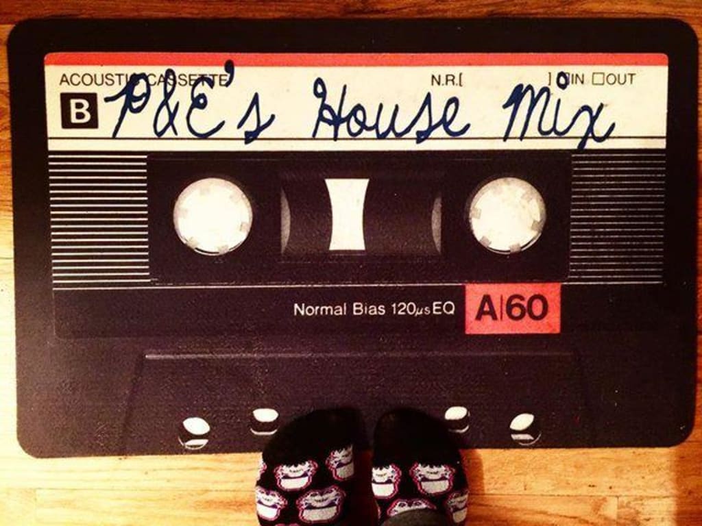 Personalized Mixtape Doormat from Uncommon Goods. Customer submitted image.