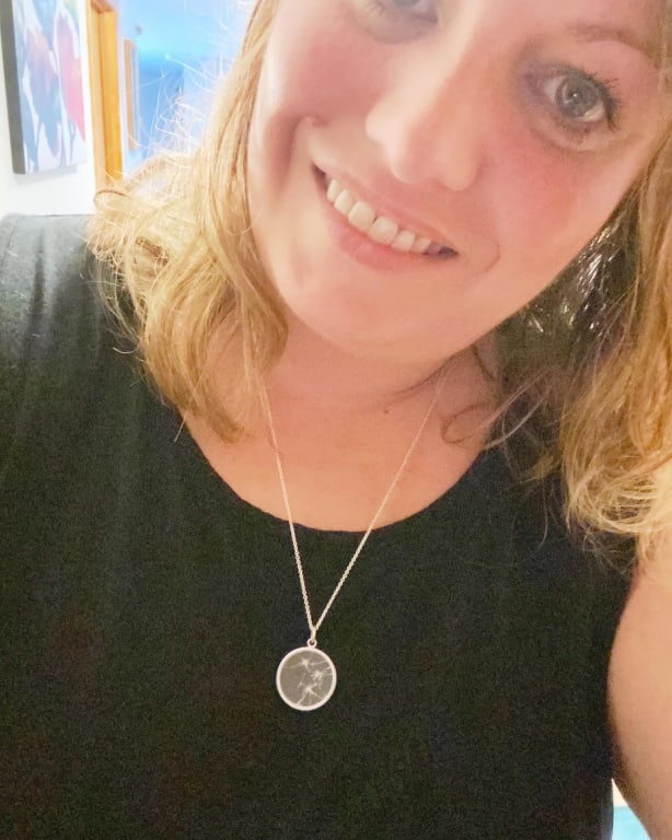 Shattered Glass Ceiling Necklace from Uncommon Goods. Customer submitted image.