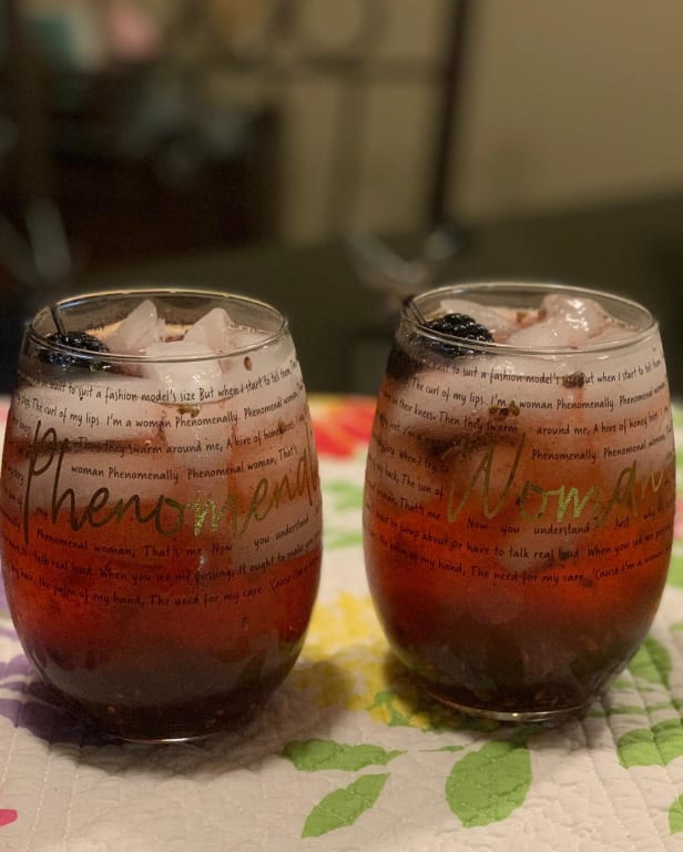 Maya Angelou Phenomenal Woman Glasses - Set of 2 from Uncommon Goods. Customer submitted image.