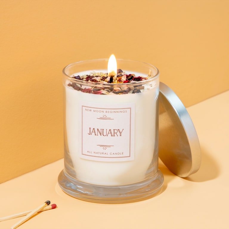 Birth Month Gemstone & Flower Candle from Uncommon Goods. Customer submitted image.