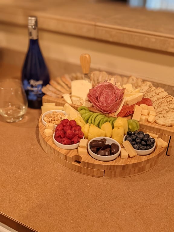 Compact Swivel Cheese & Tapas Board from Uncommon Goods. Customer submitted image.