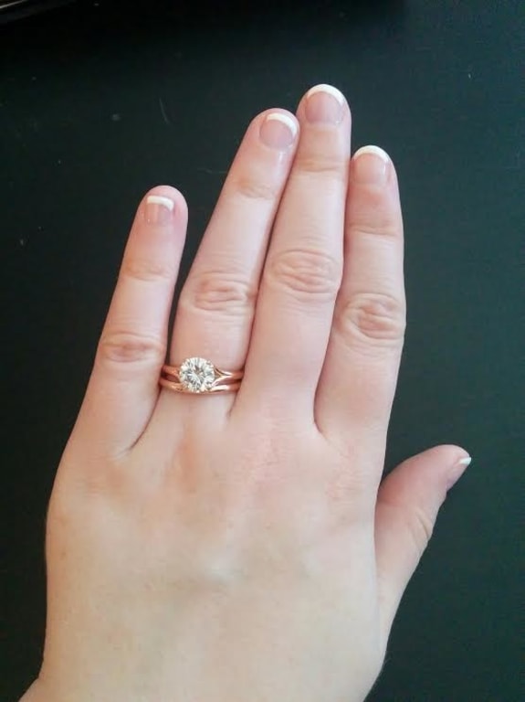 Oval diamond ring on hand