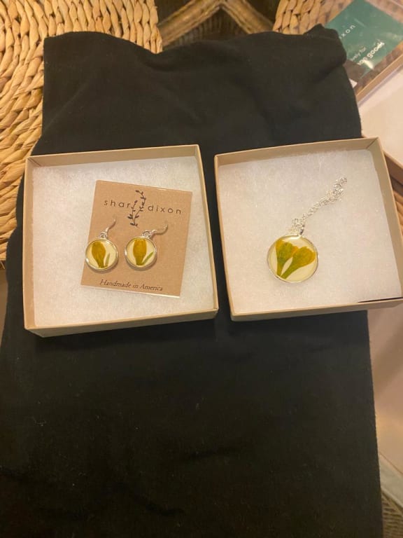Birth Flower Necklace from Uncommon Goods. Customer submitted image.