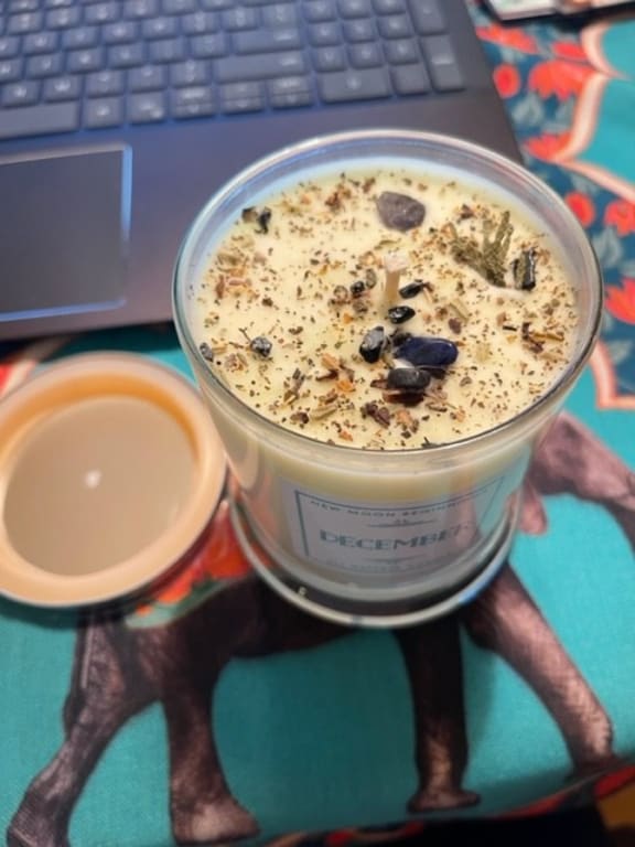 Birth Month Gemstone & Flower Candle from Uncommon Goods. Customer submitted image.
