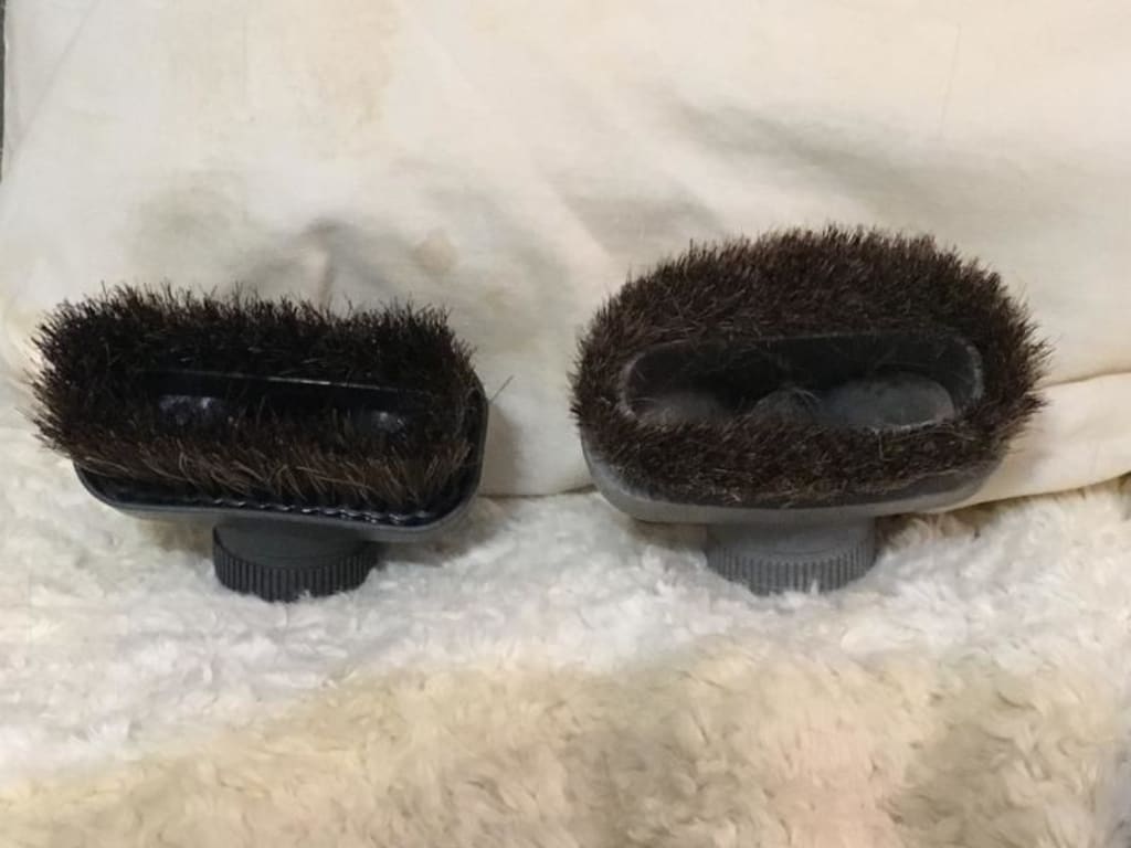 Comparing new canister vacuum brush (L) with old one (R)