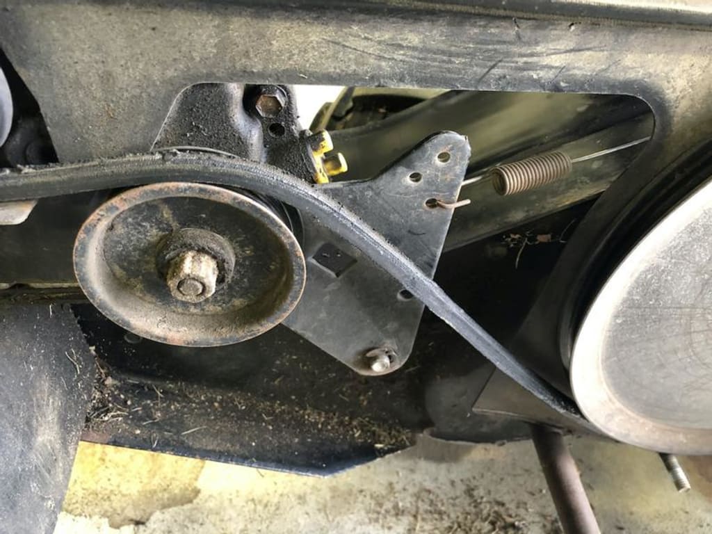 Clutch pulley and attached clutch spring. New clutch cable includes attached clutch spring.