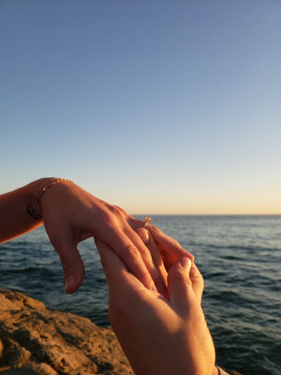 Oval diamond ring on hand