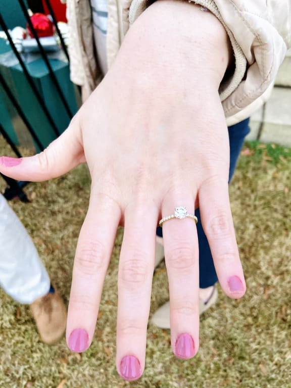 Oval diamond ring on hand