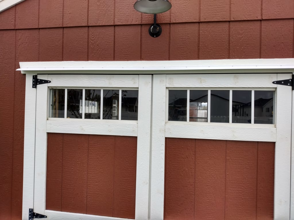 Larger shop door drip edge. Keeps water out.