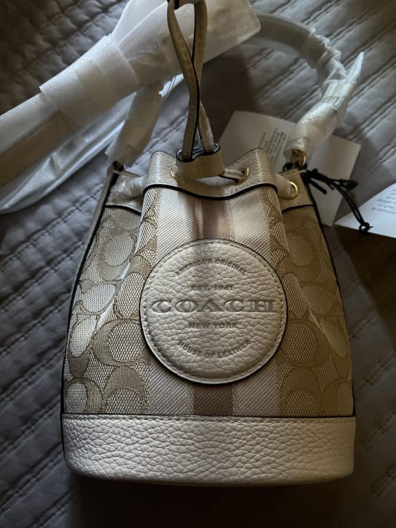 COACH Dempsey 15 Small Snowflake Print Khaki Coated Canvas Bucket Bag –  AUMI 4