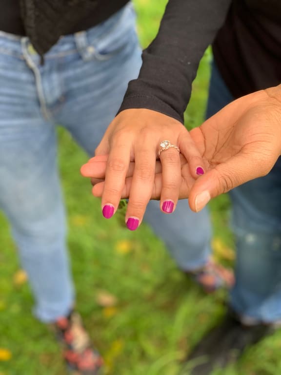 Oval diamond ring on hand